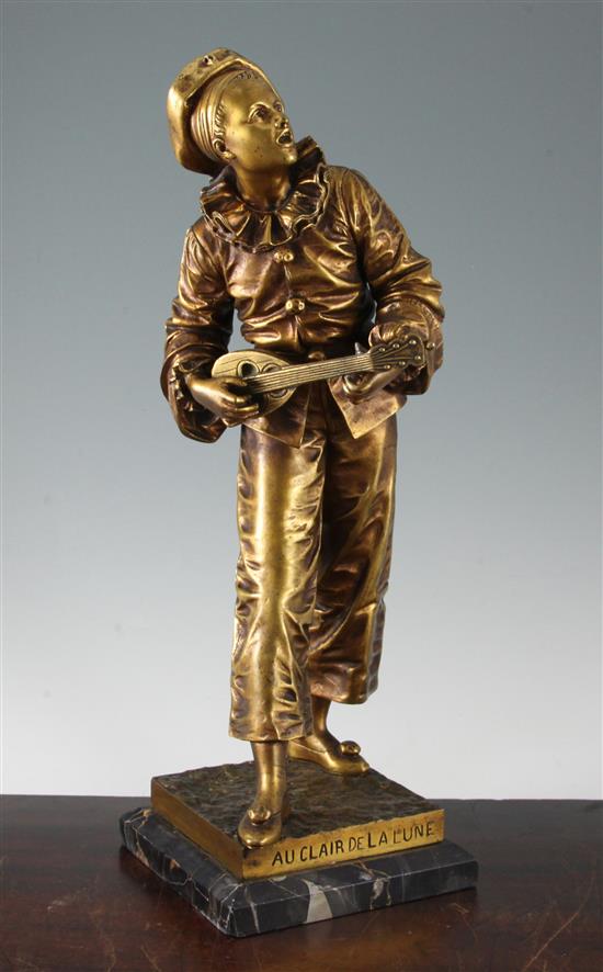 Bouret. A gilt bronze figure of a pierrot Au Claire de la Lune, H.19in.